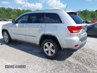 2011 Jeep Grand Cherokee Laredo with VIN 1J4RR4GG2BC714893, listed as a IAAI auction lot 42750763 with 184,475 mi miles and . Bid and sale history available at DreamBid. Image 3.