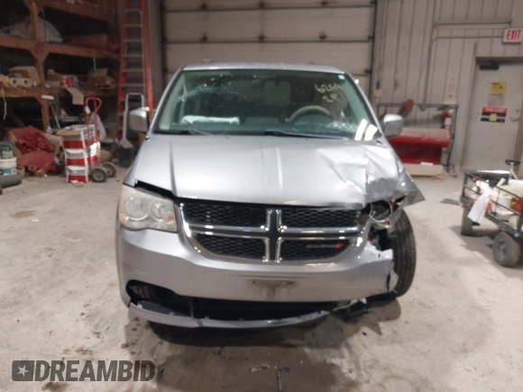 2014 Dodge Grand Caravan SXT z VIN 2C4RDGCGXER263963, wystawiony jako IAAI lot #41956264 z przebiegiem 138 815 mil mil oraz . Historia ofert i sprzedaży dostępna na DreamBid. Obrazek 12.