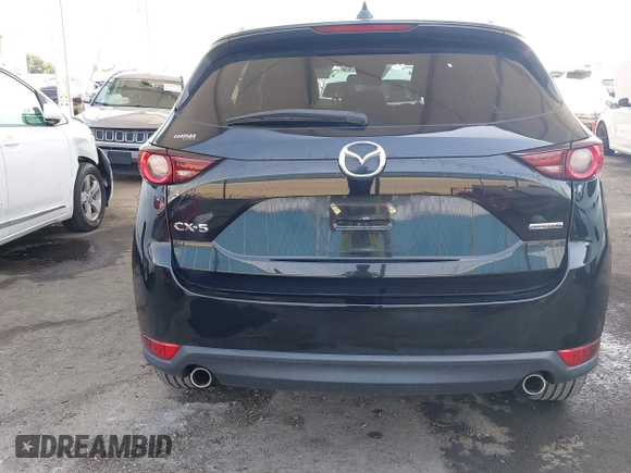 2020 Mazda CX-5 Touring with VIN JM3KFACM0L0804998, listed as a IAAI auction lot 41850998 with 44,519 mi miles. Bid and sale history available at carsss.com. Image 16.