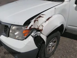 2013 Nissan Frontier S with VIN 1N6BD0CT0DN734372, listed as a IAAI auction lot 42116294 with 198,498 mi miles and . Bid and sale history available at DreamBid. Image 6.