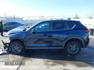 2019 Mazda CX-5 Touring with VIN JM3KFACM7K1534905, listed as a IAAI auction lot 41945607 with 56,014 mi miles. Bid and sale history available at carsss.com. Image 15.