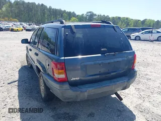 2000 Jeep Grand Cherokee Laredo with VIN 1J4G248S1YC416634, listed as a IAAI auction lot 42036197 with 140,596 mi miles and . Bid and sale history available at DreamBid. Image 3.