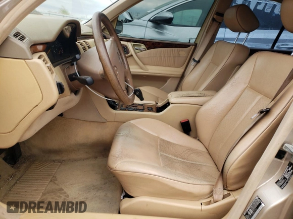 2002 Mercedes-Benz E-Class with VIN WDBJF65J12B463150, listed as a Copart auction lot 74434654 with 215,883 mi miles and Salvage Title. Bid and sale history available at carsss.com. Image 7.