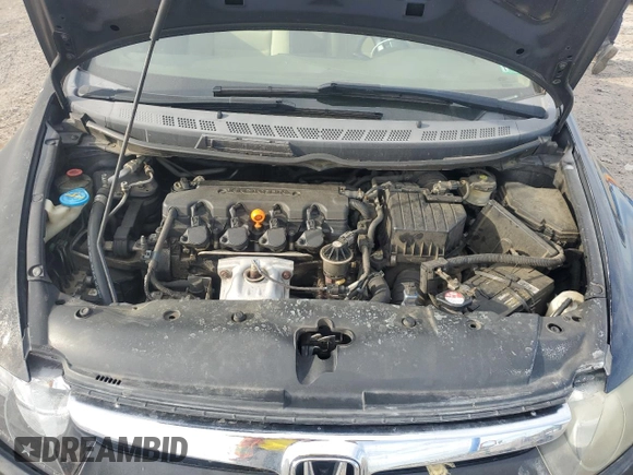 2006 Honda Civic LX z VIN 1HGFA165X6L088161, wystawiony jako Copart lot #53868135 z przebiegiem 183 370 mil mil oraz Szkoda całkowita • Salvage title. Historia ofert i sprzedaży dostępna na DreamBid. Obrazek 11.