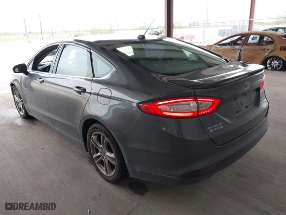 2016 Ford Fusion Energi Titanium with VIN 3FA6P0SU9GR103245, listed as a IAAI auction lot 41888435 with 123,975 mi miles. Bid and sale history available at carsss.com. Image 3.