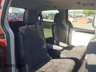 2013 Dodge Grand Caravan SXT z VIN 2C4RDGCG4DR635702, wystawiony jako IAAI lot #42092823 z przebiegiem 234 737 mil mil oraz . Historia ofert i sprzedaży dostępna na DreamBid. Obrazek 8.