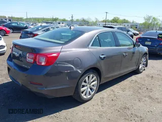 2013 Chevrolet Malibu LTZ with VIN 1G11J5SX6DF335333, listed as a IAAI auction lot 42135480 with 158,743 mi miles and . Bid and sale history available at DreamBid. Image 4.