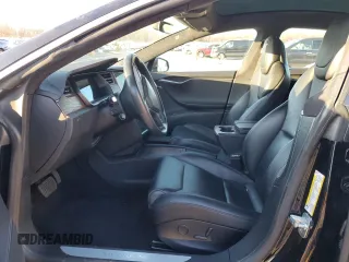 2019 Tesla Model S 75D with VIN 5YJSA1E23KF330239, listed as a Copart auction lot 86737544 with Not provided miles and Salvage title. Bid and sale history available at DreamBid. Image 7.