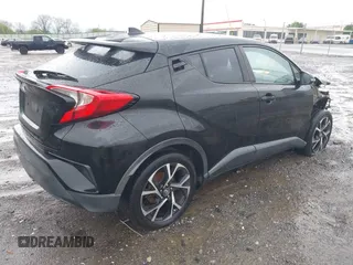2018 Toyota C-HR XLE with VIN NMTKHMBX4JR032773, listed as a IAAI auction lot 41957588 with 100,691 mi miles. Bid and sale history available at carsss.com. Image 4.