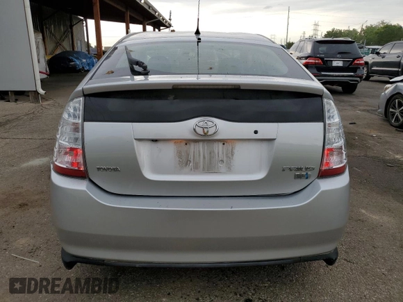2007 Toyota Prius z VIN JTDKB20U777637924, wystawiony jako Copart lot #61023455 z przebiegiem 161 572 mil mil oraz Czysty tytuł • Clean title. Historia ofert i sprzedaży dostępna na DreamBid. Obrazek 6.