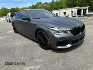 2018 BMW 7 Series M760i xDrive z VIN WBA7H6C54JG614931, wystawiony jako Copart lot #59110125 z przebiegiem 71 953 mil mil oraz Czysty tytuł • Clean title. Historia ofert i sprzedaży dostępna na DreamBid. Obrazek 4.