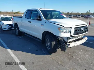 2010 Toyota Tundra 4WD Truck with VIN 5TFUY5F17AX155936, listed as a IAAI auction lot 41285463 with 96,530 mi miles. Bid and sale history available at carsss.com. Image 1.