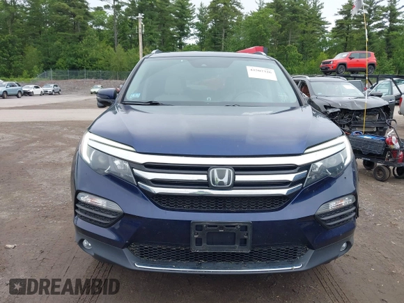 2017 Honda Pilot Touring with VIN 5FNYF6H99HB093136, listed as a IAAI auction lot 42507326 with 125,579 mi miles and . Bid and sale history available at DreamBid. Image 12.