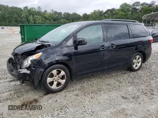 2015 Toyota Sienna LE AAS with VIN 5TDKK3DC4FS606884, listed as a Copart auction lot 59282015 with 187,495 mi miles and Salvage title. Bid and sale history available at DreamBid. Image 1.