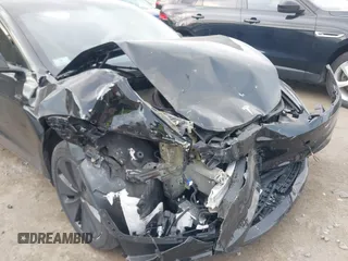 2024 Tesla Model 3 z VIN 5YJ3E1EA8RF755840, wystawiony jako IAAI lot #41677744 z przebiegiem 9 695 mil mil oraz . Historia ofert i sprzedaży dostępna na DreamBid. Obrazek 6.