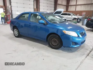 2009 Toyota Corolla with VIN JTDBL40E699037792, listed as a IAAI auction lot 41838231 with 199,690 mi miles. Bid and sale history available at carsss.com. Image 1.