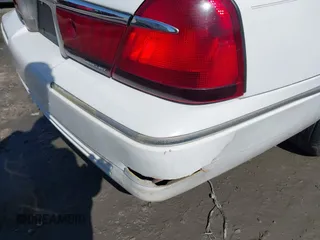 2000 Mercury Grand Marquis LS z VIN 2MEFM75W3YX689323, wystawiony jako IAAI lot #42019687 z przebiegiem 241 045 mil mil oraz . Historia ofert i sprzedaży dostępna na DreamBid. Obrazek 6.