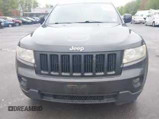 2011 Jeep Grand Cherokee Laredo with VIN 1J4RR4GGXBC604304, listed as a IAAI auction lot 42201742 with 196,483 mi miles and . Bid and sale history available at DreamBid. Image 6.