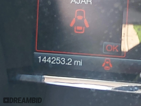 2014 Lincoln MKS with VIN 1LNHL9EK0EG608300, listed as a IAAI auction lot 41900902 with 144,253 mi miles. Bid and sale history available at carsss.com. Image 15.