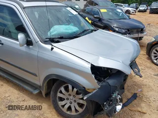 2006 Honda CR-V EX z VIN SHSRD78886U407209, wystawiony jako IAAI lot #42337124 z przebiegiem Nie podano mil oraz . Historia ofert i sprzedaży dostępna na DreamBid. Obrazek 13.