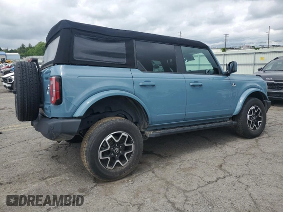 2023 Ford Bronco z VIN 1FMEE5DP9PLB17477, wystawiony jako Copart lot #58829615 z przebiegiem 22 069 mil mil oraz Szkoda całkowita • Salvage title. Historia ofert i sprzedaży dostępna na DreamBid. Obrazek 3.