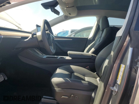 2024 Tesla Model Y Long Range with VIN 7SAYGDEE6RA321064, listed as a Copart auction lot 58889795 with 48,857 mi miles and Salvage title. Bid and sale history available at DreamBid. Image 7.