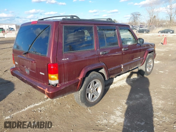 2000 Jeep Cherokee Classic with VIN 1J4FF58S7YL122676, listed as a IAAI auction lot 41710310 with 124,758 mi miles. Bid and sale history available at carsss.com. Image 4.