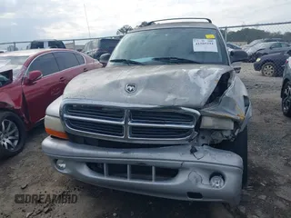 2002 Dodge Durango z VIN 1B4HR48N72F124778, wystawiony jako IAAI lot #41505251 z przebiegiem 264 232 mil mil oraz . Historia ofert i sprzedaży dostępna na DreamBid. Obrazek 13.