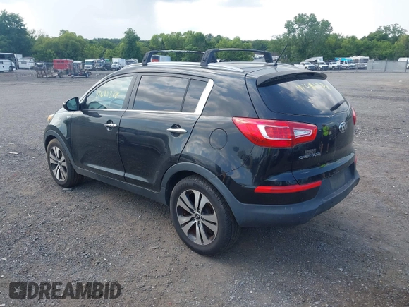 2013 Kia Sportage EX with VIN KNDPCCA23D7427564, listed as a IAAI auction lot 42681328 with 111,963 mi miles and . Bid and sale history available at DreamBid. Image 3.