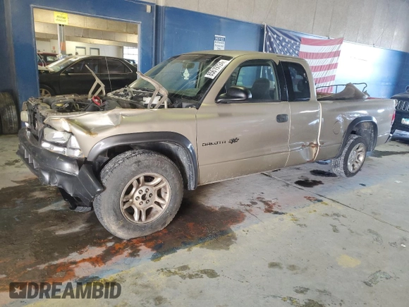 2002 Dodge Dakota with VIN 1B7GL12XX2S569628, listed as a Copart auction lot 85619724 with 165,154 mi miles and Salvage Title. Bid and sale history available at carsss.com. Image 1.
