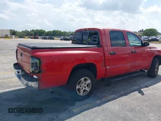 2006 Dodge Dakota SLT with VIN 1D7HE48K06S517772, listed as a IAAI auction lot 41946417 with 255,236 mi miles and . Bid and sale history available at carsss.com. Image 4.