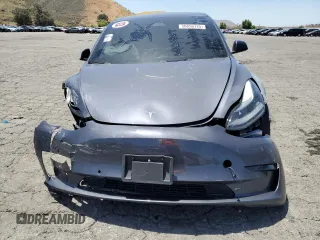 2022 Tesla Model 3 z VIN 5YJ3E1EA1NF191426, wystawiony jako Copart lot #56656125 z przebiegiem 84 255 mil mil oraz Czysty tytuł • Clean title. Historia ofert i sprzedaży dostępna na DreamBid. Obrazek 5.