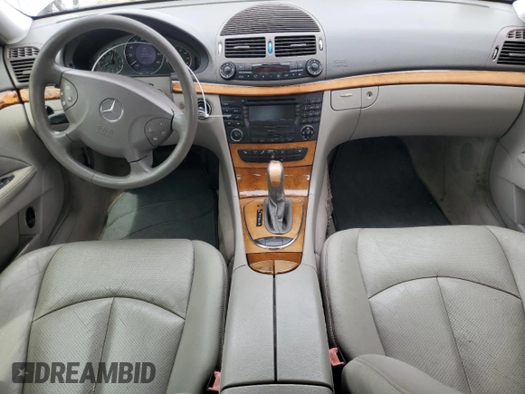 2003 Mercedes-Benz E-Class 5.0L with VIN WDBUF70J03A112909, listed as a Copart auction lot 49924865 with 158,244 mi miles and Salvage Title. Bid and sale history available at carsss.com. Image 8.