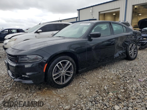 2019 Dodge Charger SXT with VIN 2C3CDXJG9KH523879, listed as a Copart auction lot 82988364 with 71,386 mi miles and Salvage Title. Bid and sale history available at DreamBid. Image 1.