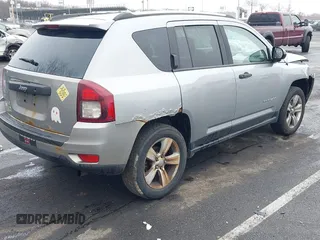 2014 Jeep Compass Sport with VIN 1C4NJDBB8ED734667, listed as a IAAI auction lot 41836914 with 221,028 mi miles. Bid and sale history available at carsss.com. Image 4.