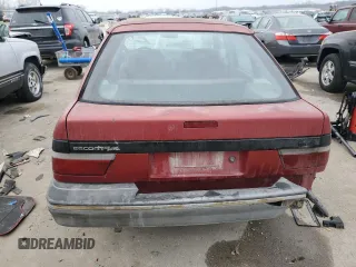 1989 Ford Escort z VIN 1FAPP959XKW361294, wystawiony jako Copart lot #83879674 z przebiegiem 12 406 mil mil oraz Szkody całkowita. Historia ofert i sprzedaży dostępna na DreamBid. Obrazek 6.