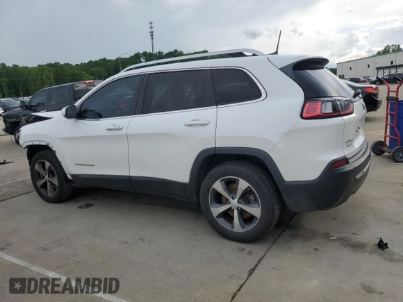 2019 Jeep Cherokee Limited with VIN 1C4PJMDX2KD409798, listed as a Copart auction lot 56913685 with 59,299 mi miles and Salvage title. Bid and sale history available at DreamBid. Image 2.