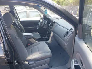 2006 Honda Pilot EX with VIN 2HKYF184X6H537601, listed as a IAAI auction lot 42226737 with 159,982 mi miles and . Bid and sale history available at DreamBid. Image 5.