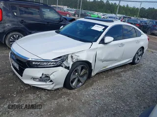 2019 Honda Accord Touring with VIN 1HGCV2F96KA009252, listed as a IAAI auction lot 42003043 with 76,249 mi miles and . Bid and sale history available at DreamBid. Image 17.