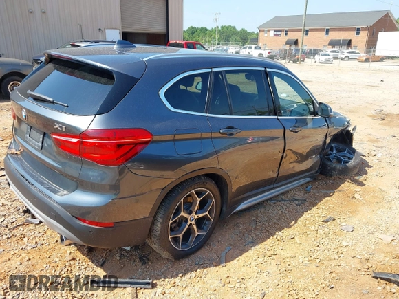2016 BMW X1 xDrive28i with VIN WBXHT3C31G5E47828, listed as a IAAI auction lot 42592338 with 91,927 mi miles and . Bid and sale history available at DreamBid. Image 4.