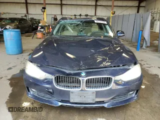 2014 BMW 3 Series 320i with VIN WBA3B1G5XENT00747, listed as a Copart auction lot 64737935 with 123,374 mi miles and Salvage title. Bid and sale history available at DreamBid. Image 5.