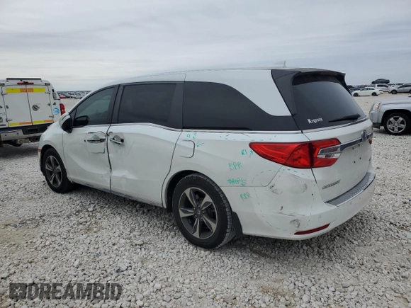 2020 Honda Odyssey Touring with VIN 5FNRL6H88LB014164, listed as a Copart auction lot 42925415 with 67,667 mi miles and Salvage title. Bid and sale history available at DreamBid. Image 2.