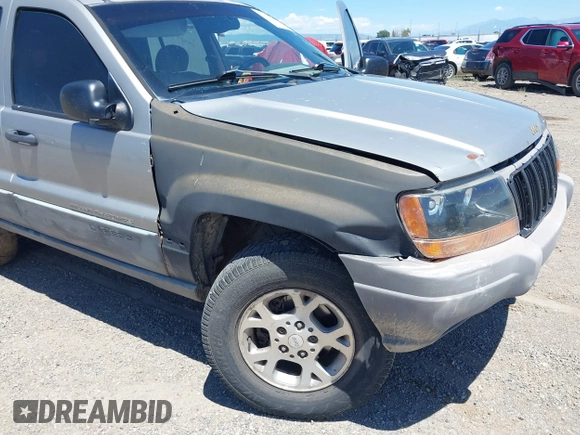 2000 Jeep Grand Cherokee Laredo with VIN 1J4GW48S8YC172274, listed as a IAAI auction lot 39738087 with 335,809 mi miles and . Bid and sale history available at DreamBid. Image 6.