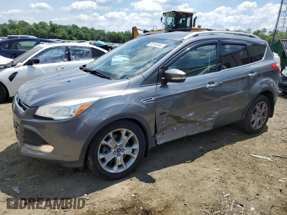 2014 Ford Escape Titanium with VIN 1FMCU9J91EUC90702, listed as a Copart auction lot 59116194 with 117,984 mi miles and Salvage Title. Bid and sale history available at DreamBid. Image 1.