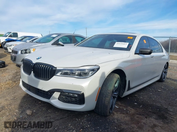 2017 BMW 7 Series 750i with VIN WBA7F0C58HGM21467, listed as a IAAI auction lot 41632663 with 136,620 mi miles. Bid and sale history available at carsss.com. Image 2.