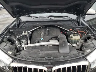 2017 BMW X6 sDrive35i with VIN 5UXKU0C36H0G69163, listed as a Copart auction lot 87044784 with 99,452 mi miles and Salvage Title. Bid and sale history available at carsss.com. Image 14.