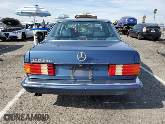 1986 Mercedes-Benz 560 with VIN WDBCA39DXGA234294, listed as a Copart auction lot 45984235 with 90,933 mi miles and Clean Title. Bid and sale history available at DreamBid. Image 6.