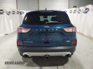 2020 Ford Escape Titanium z VIN 1FMCU9J98LUA93393, wystawiony jako Copart lot #65366925 z przebiegiem 74 750 mil mil oraz Czysty tytuł • Clean title. Historia ofert i sprzedaży dostępna na DreamBid. Obrazek 6.