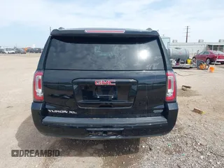 2018 GMC Yukon XL SLT with VIN 1GKS1GKC3JR223544, listed as a IAAI auction lot 41822836 with 164,430 mi miles and . Bid and sale history available at carsss.com. Image 17.