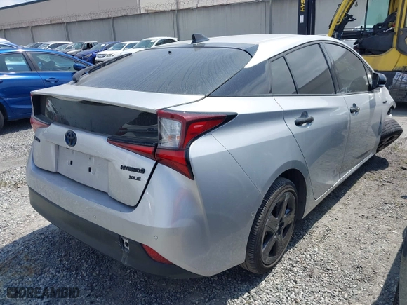 2022 Toyota Prius L Eco with VIN JTDKAMFU8N3164240, listed as a IAAI auction lot 41892462 with 35,980 mi miles. Bid and sale history available at carsss.com. Image 4.